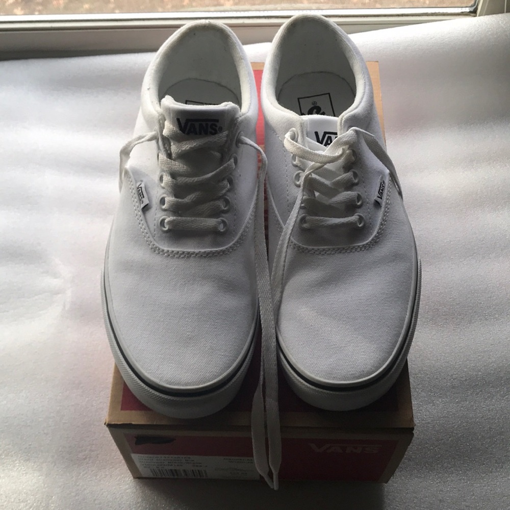 All white canvas vans